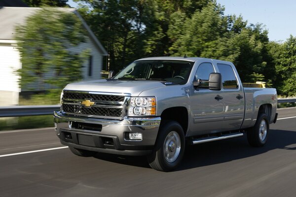 Chevrolet cargo jeep rushes along the road