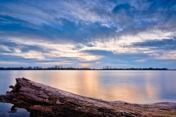 An ugly landscape. Sunset by the water