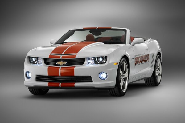 White Chevrolet with red stripes on the hood