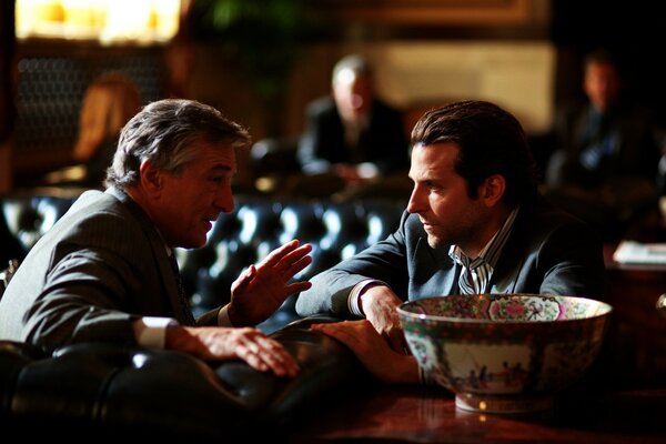 Two men in an oriental cafe