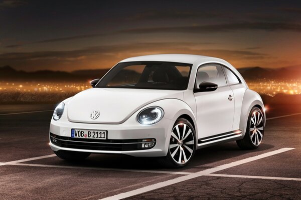 White volkswagen beetle type car