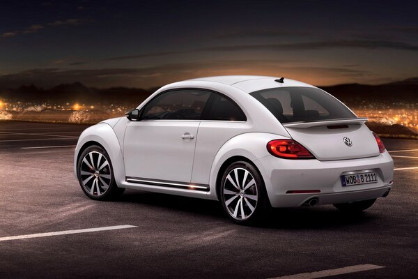 White Volkswagen car on the asphalt