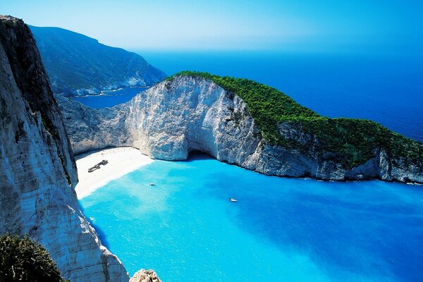 Mountain landscape with blue ocean