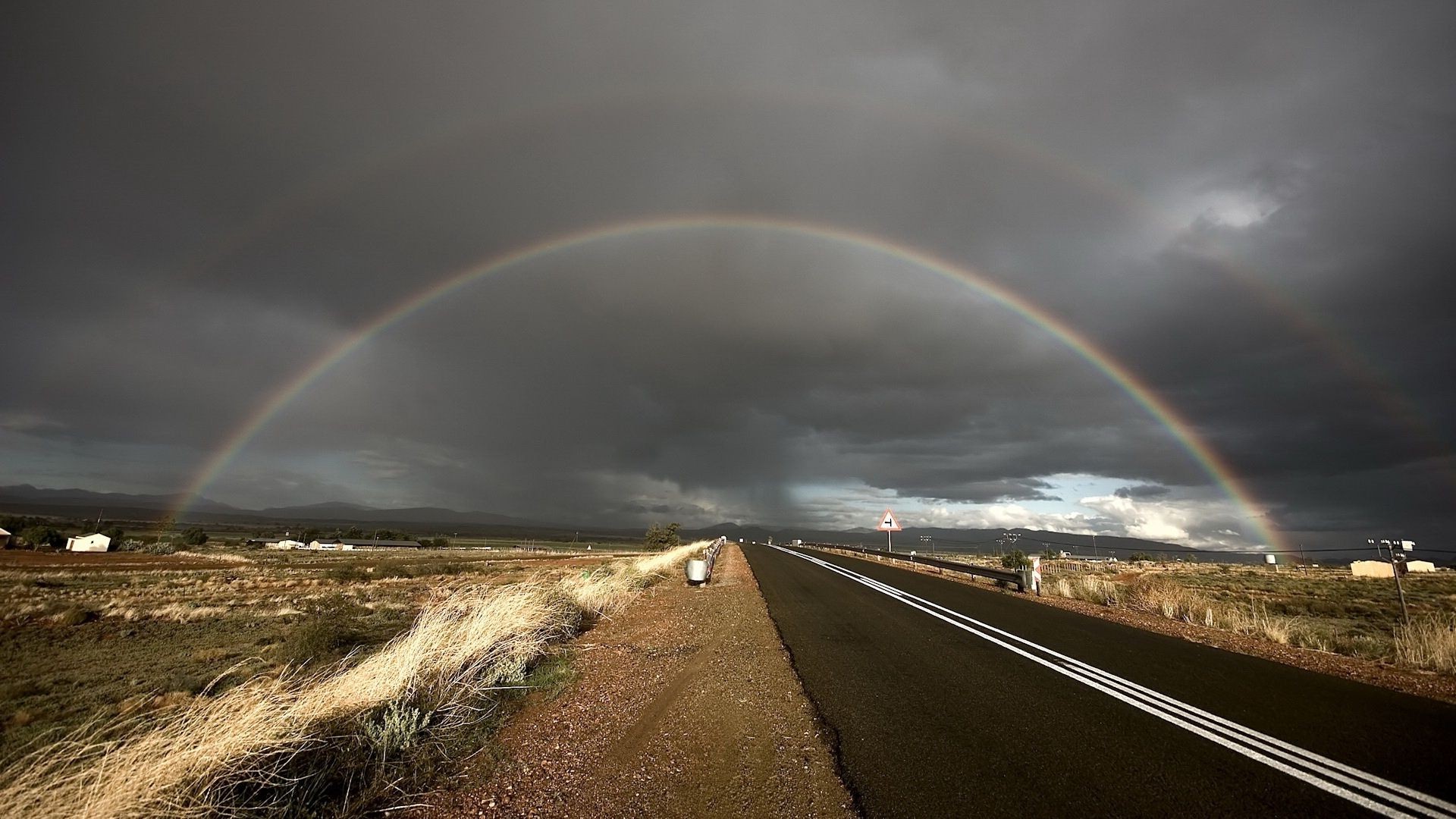 arco iris tormenta lluvia carretera paisaje carretera cielo viajes tiempo calle