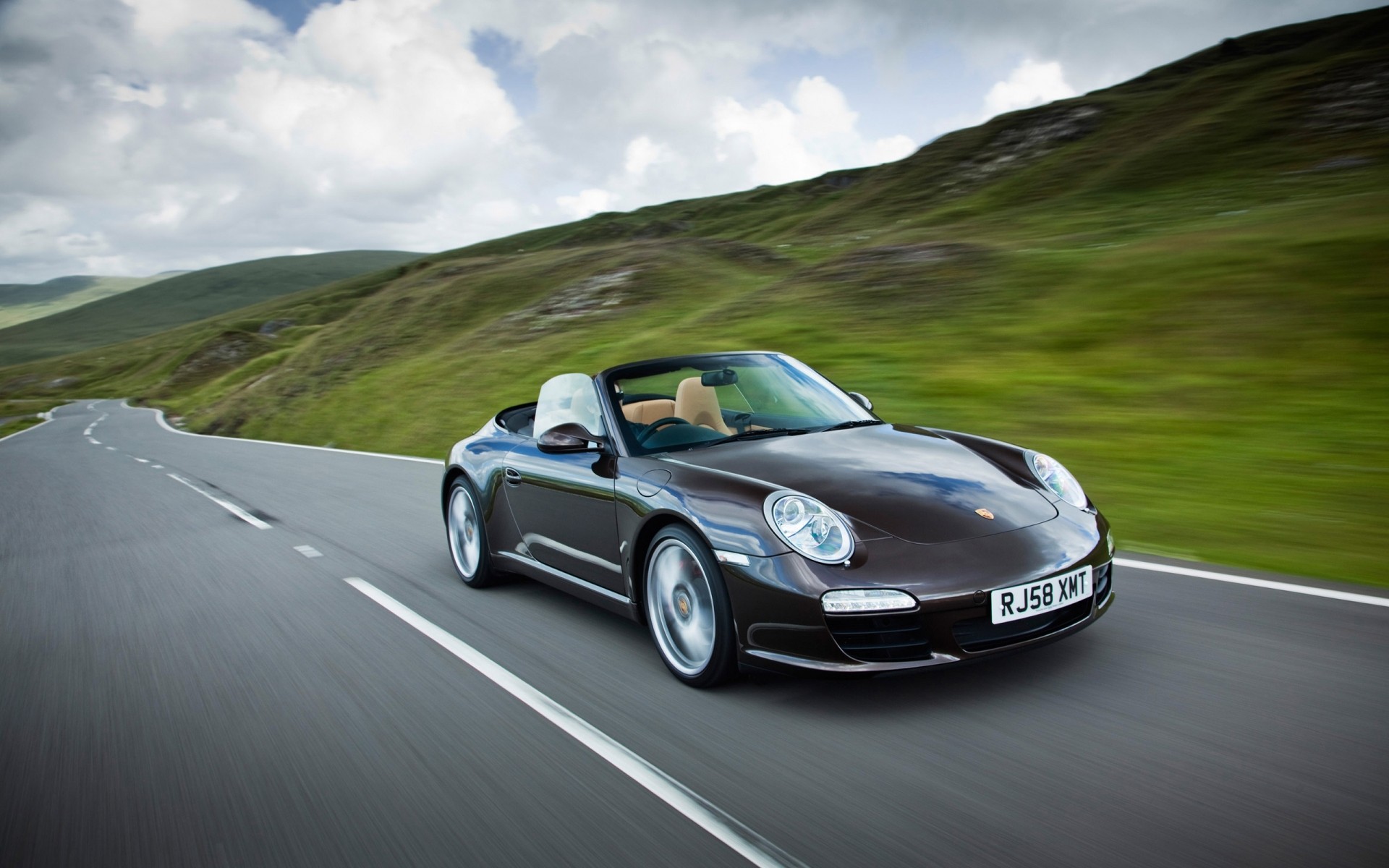 porsche car blacktop asphalt vehicle hurry fast blur pavement action noon road transportation system