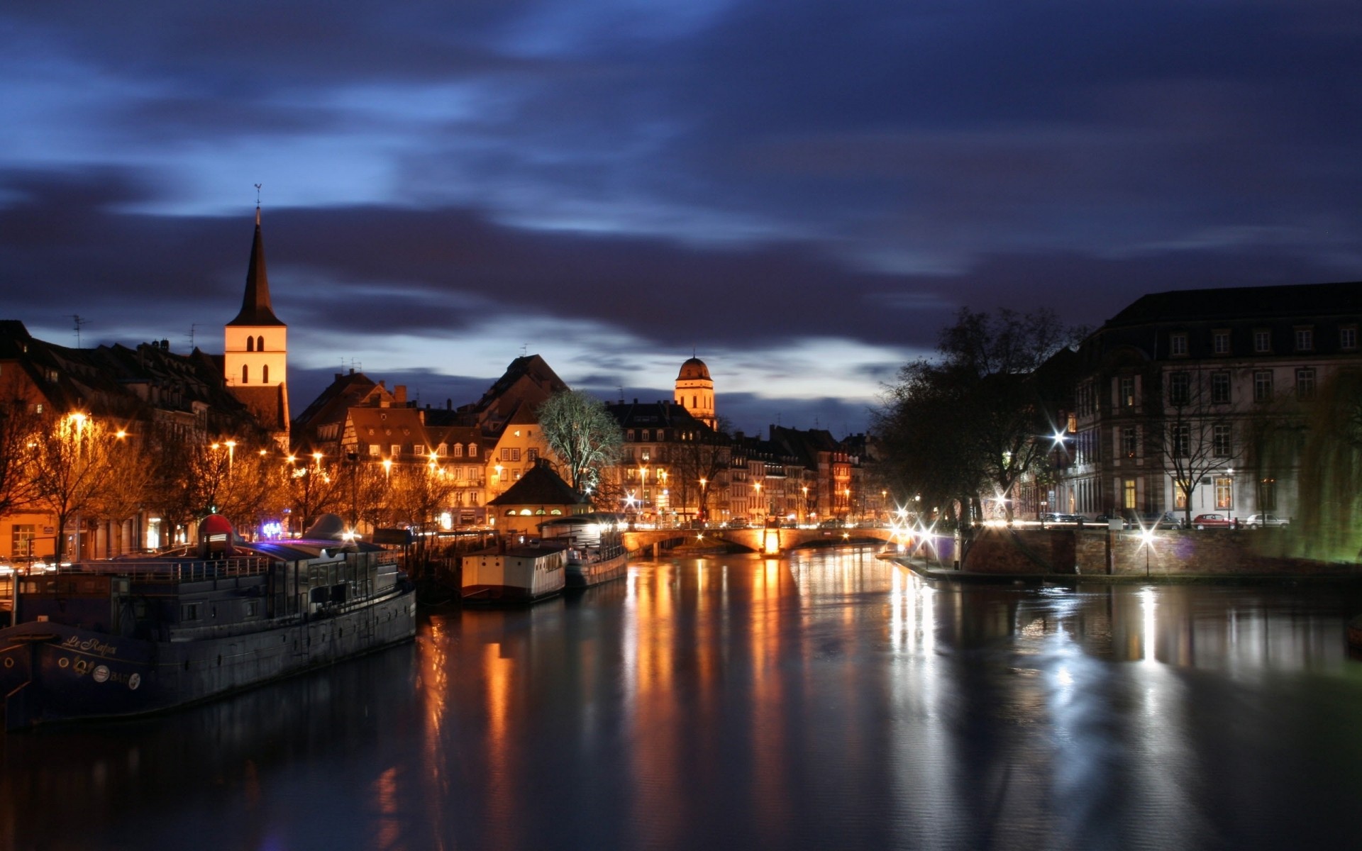 france river sunset city water dusk architecture reflection bridge travel evening church dawn cityscape cathedral sky building outdoors town illuminated