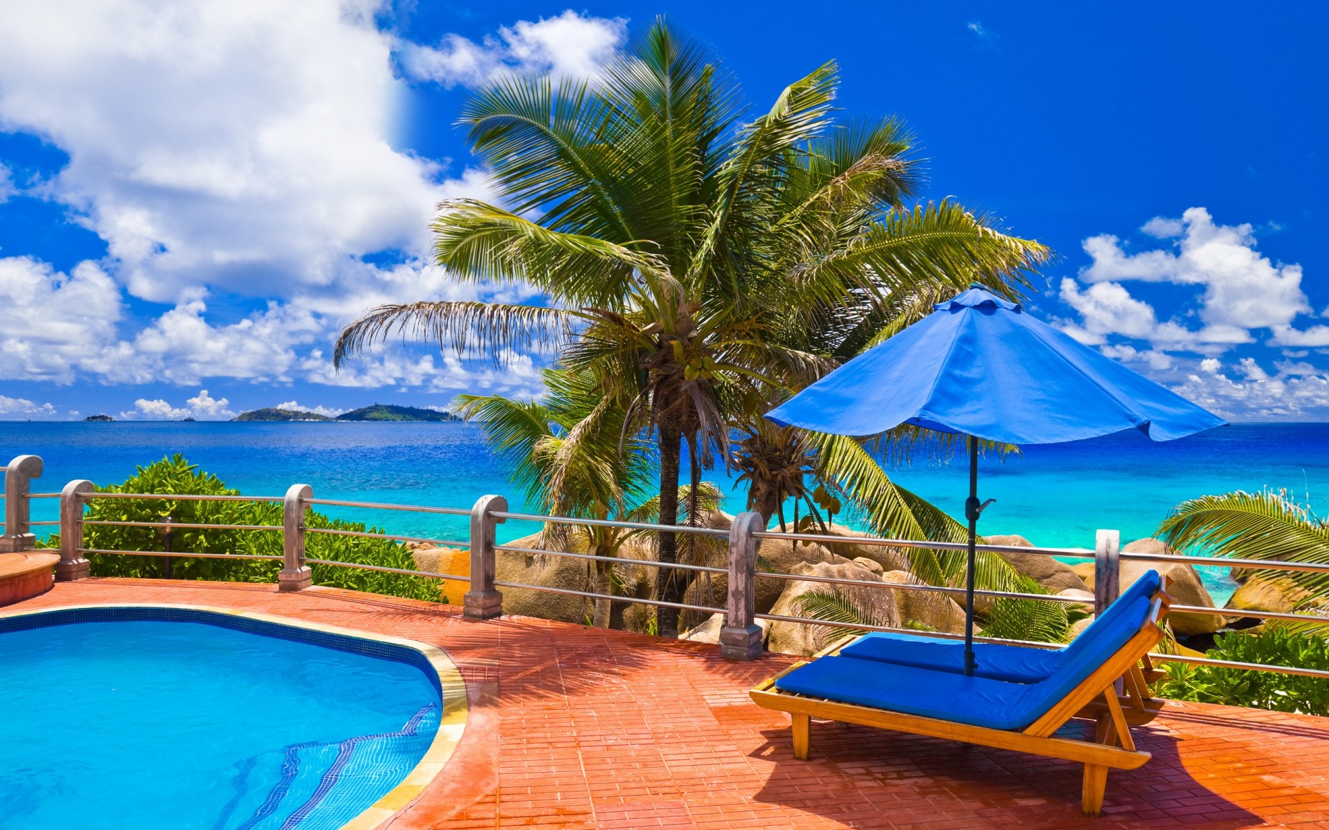 été station balnéaire plage tropical océan paradis vacances détente île palmiers sable loisirs turquoise voyage hôtel mer eau exotique chaise soleil piscine mer palmiers nuages ciel