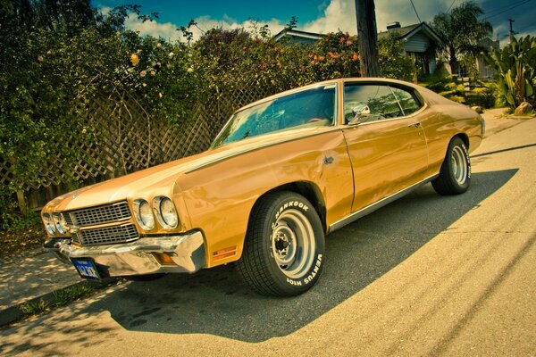 Retro Chevrolet car on the background