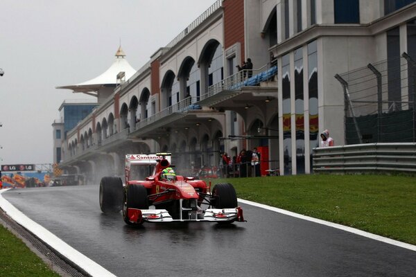 Racing car on a wet road