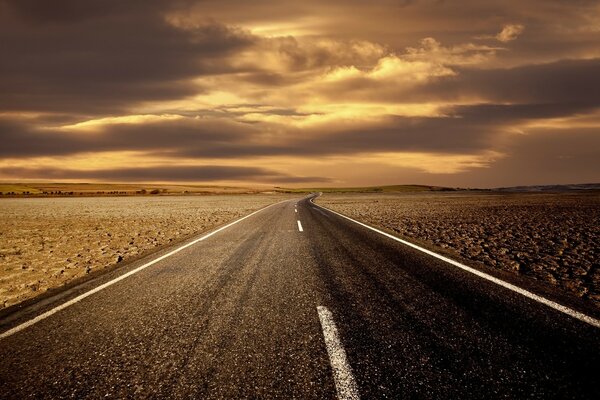 Smooth highway into a beautiful sunset