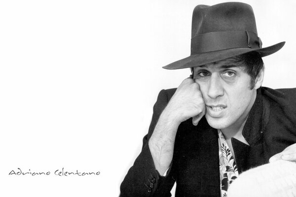 Andriano Celintano in a hat