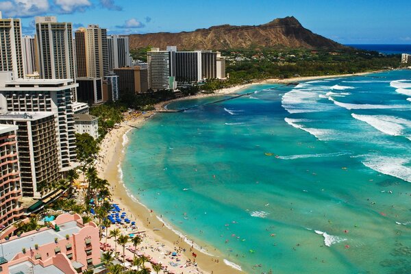 Tall buildings are located by the sea