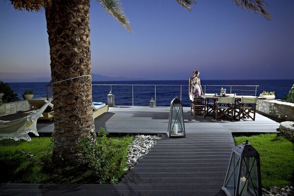 Summer evening in a restaurant by the ocean