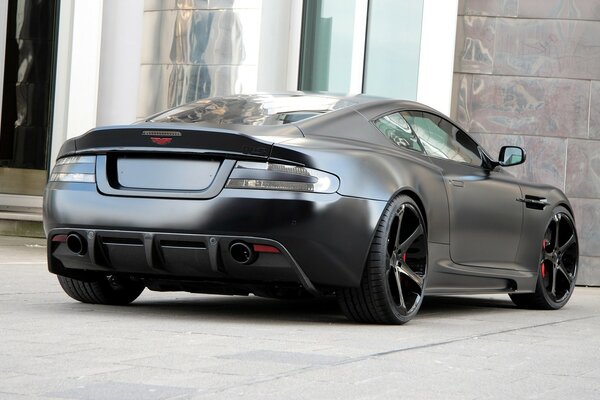 Black aston martin on the street