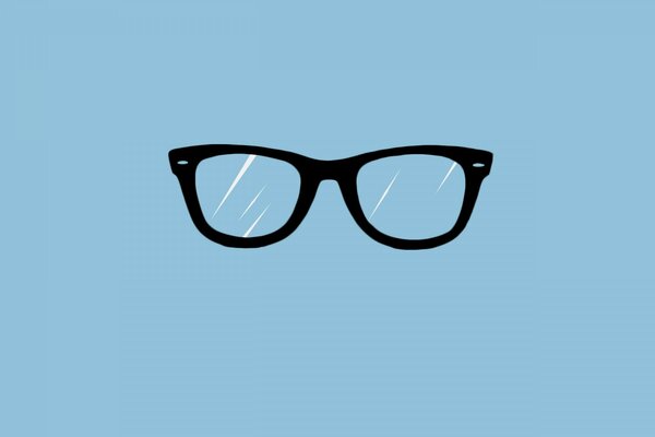 Black glasses on a blue background