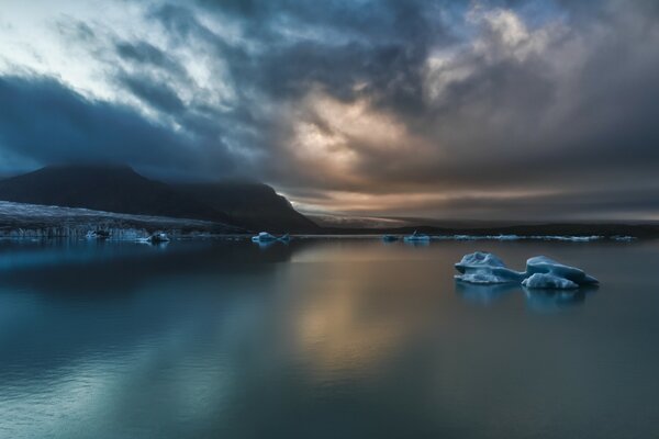 Grey clouds over the blue sea