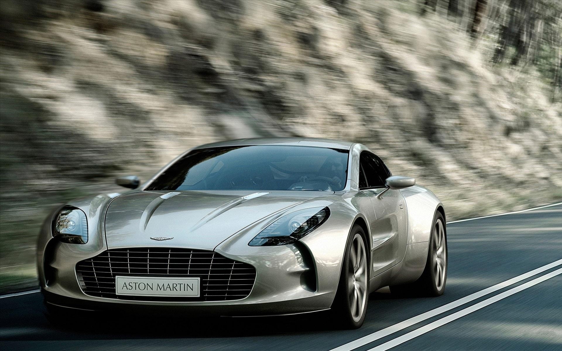 aston martin auto auto asfalto veloce correre guidare nigella automobile marciapiede sistema di trasporto ruote azione coupé corsa aston martin coupe