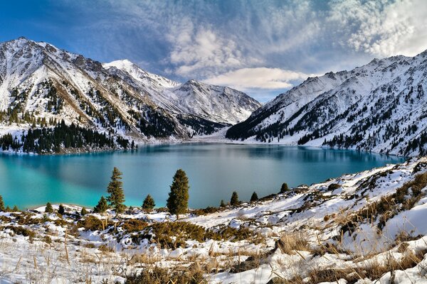 Lake in the mountains after a snowfall