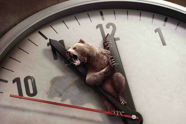 Imagen humorística de un reloj con un oso