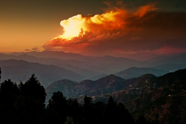 The landscape of the evening fiery sunset