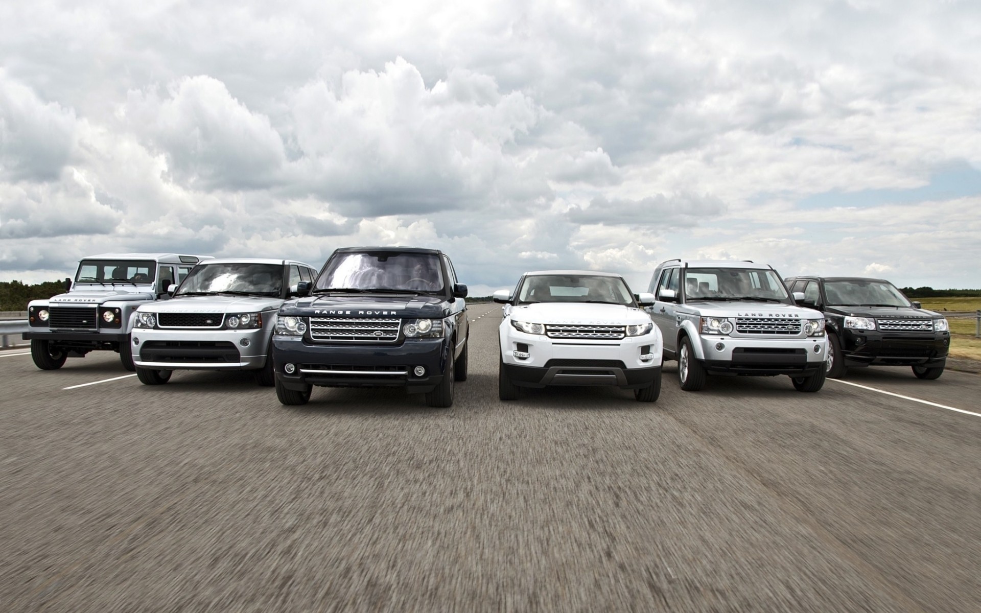 range rover auto auto asfalto sistema di trasporto strada nigella marciapiede mezzogiorno viaggio sbrigati difensore sport evok scoperta freelander