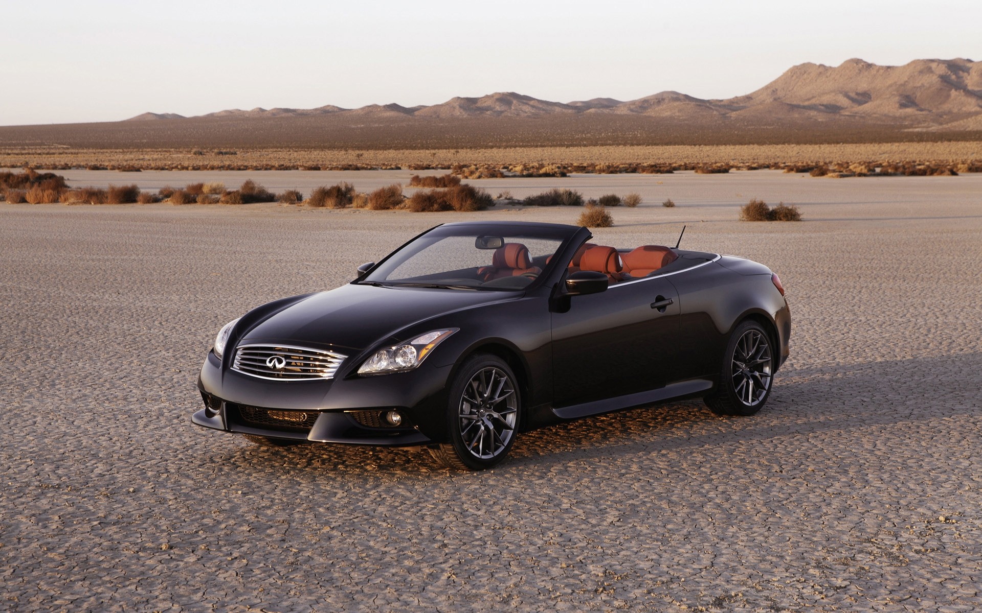 infiniti car blacktop vehicle noon desert pavement hurry beach transportation system asphalt convertible