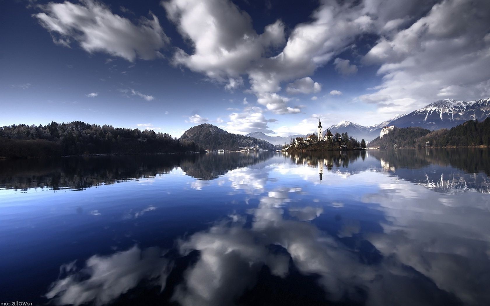 lake snow winter water dawn landscape reflection sunset nature cold mountain ice sky outdoors