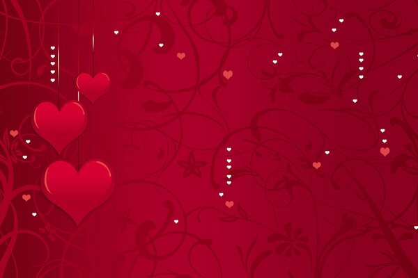 Red hearts on a background with flowers