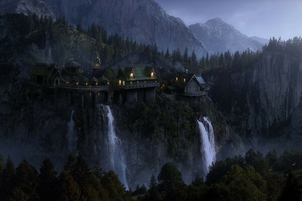 Fantasía. Castillo en la montaña. Cascada. Niebla