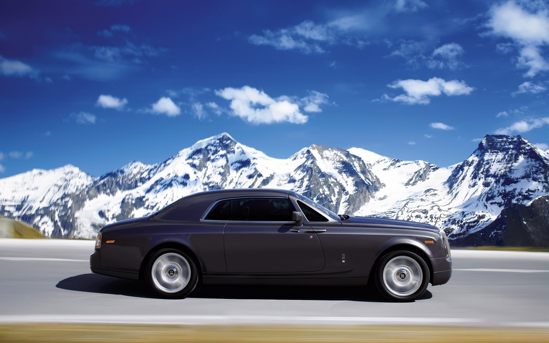 rolls royce car vehicle transportation system snow mountain travel road automotive hood hurry action