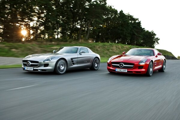 A red car overtakes a gray one