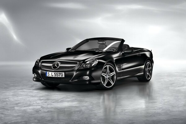 Mercedes-benz black. A convertible. Fast cars