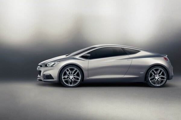 Silver car on a gray background