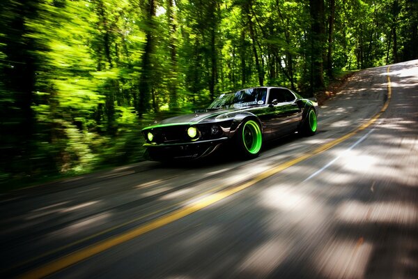 A tuned car dissects on the road