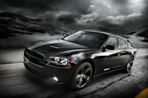 Dodge black car in motion