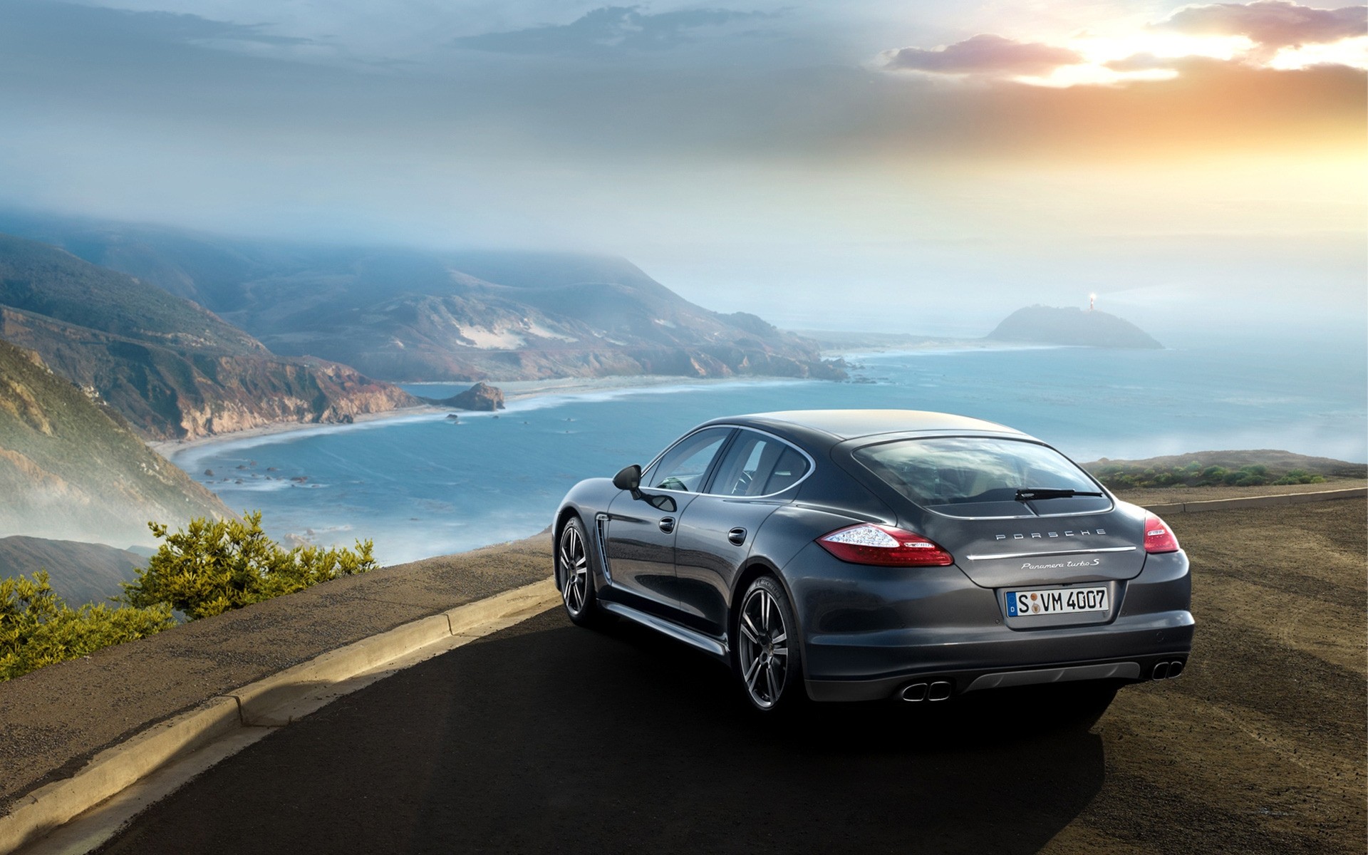 porsche car travel asphalt beach road vehicle sky landscape sea ocean blacktop water noon seashore