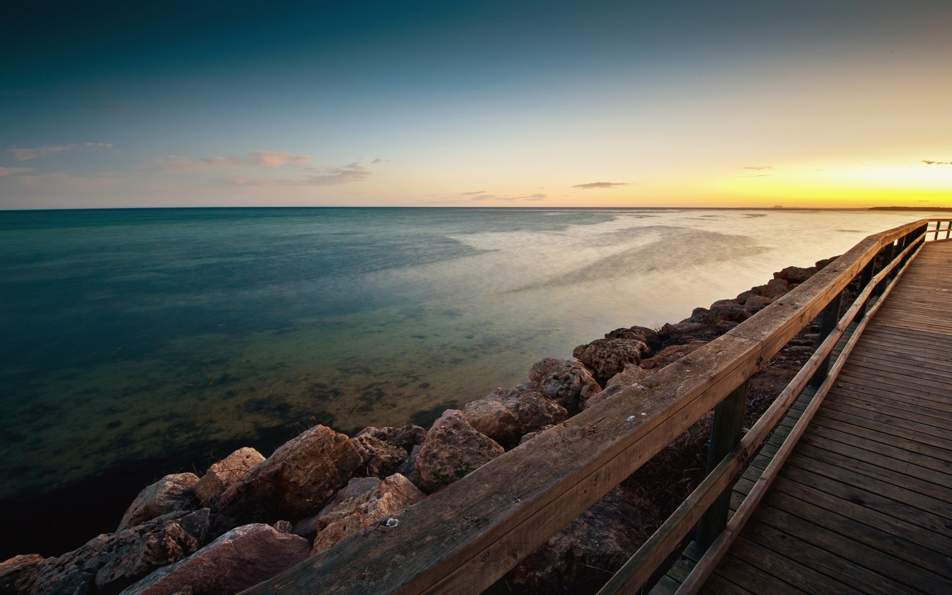 landschaft sonnenuntergang strand wasser meer ozean meer landschaft himmel reisen dämmerung dämmerung abend landschaft sonne licht steine steine