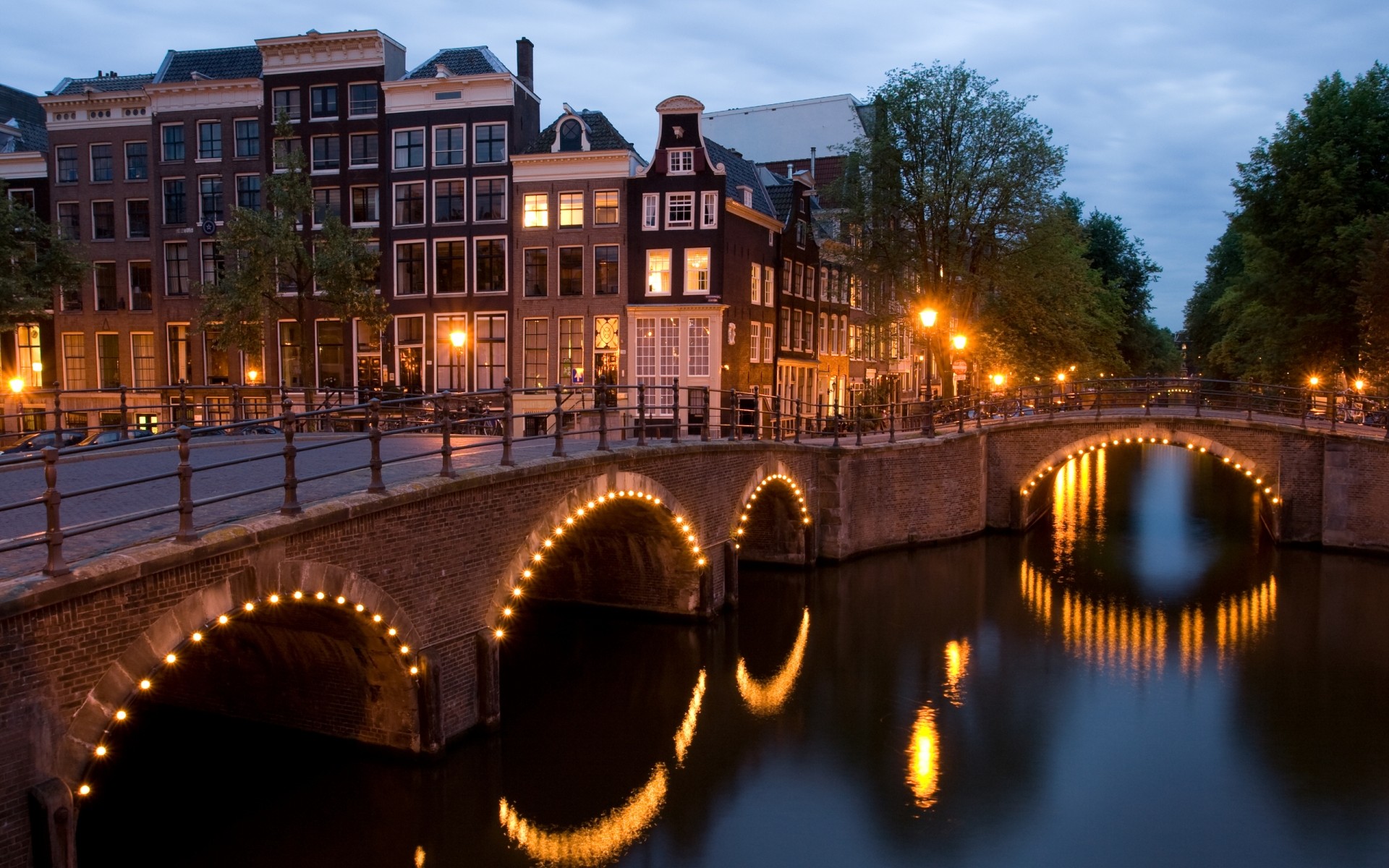 other city bridge city travel architecture building water river urban outdoors tourism dusk evening light sky town sunset reflection sight street keizersgracht netherlands lights holland