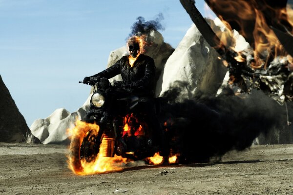 A burning skeleton on a black motorcycle