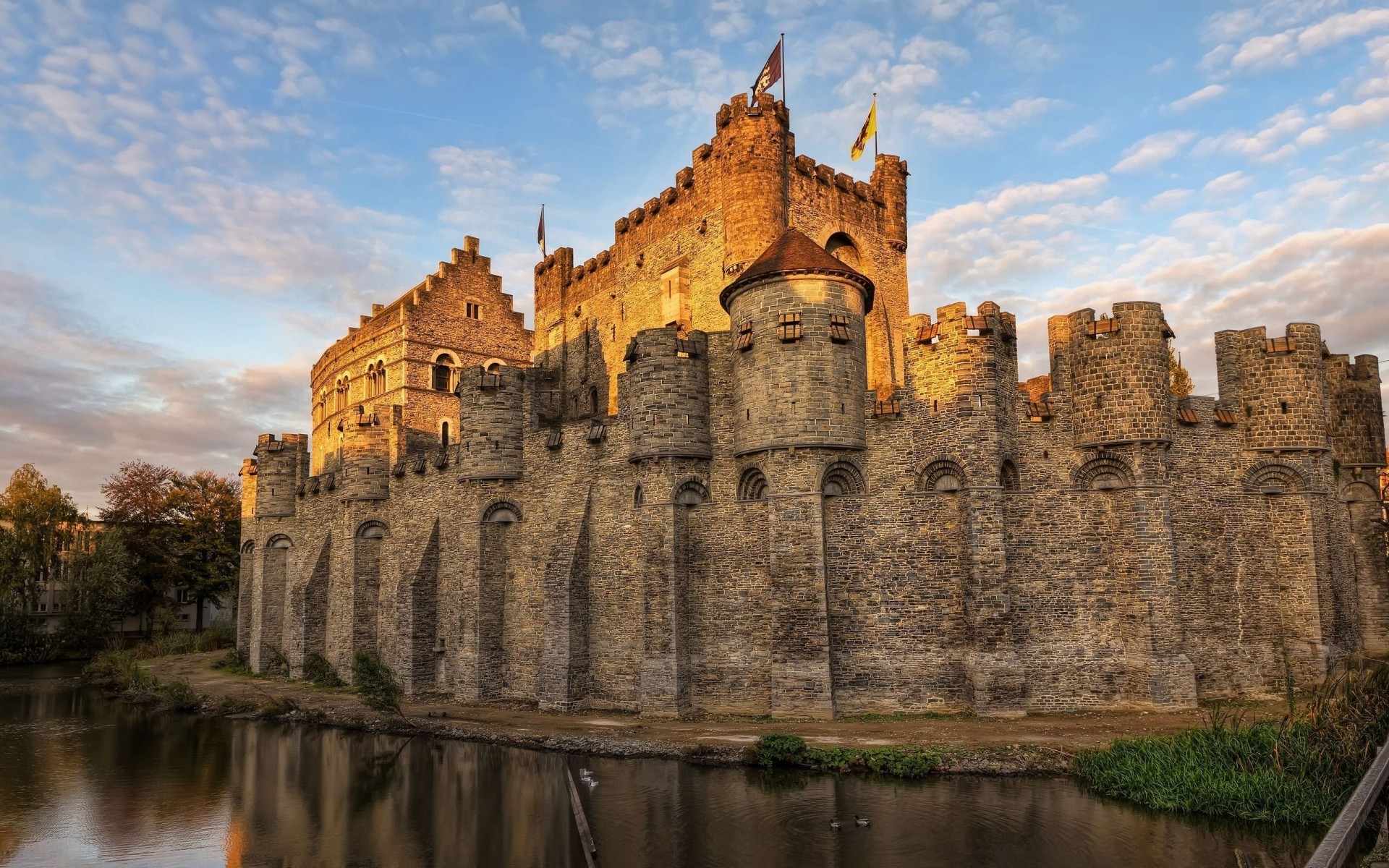 other city architecture castle travel ancient gothic building old fortress tower fortification outdoors sky river tourism landmark historic moat stone monument hdr background palace