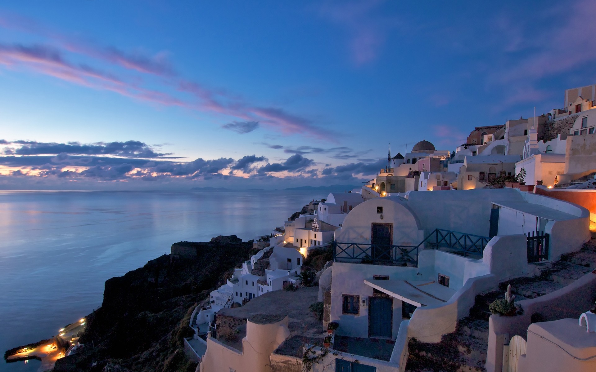 greece sea water travel seashore architecture sky beach landscape city ocean sunset outdoors evening tourism house harbor scenic lights background