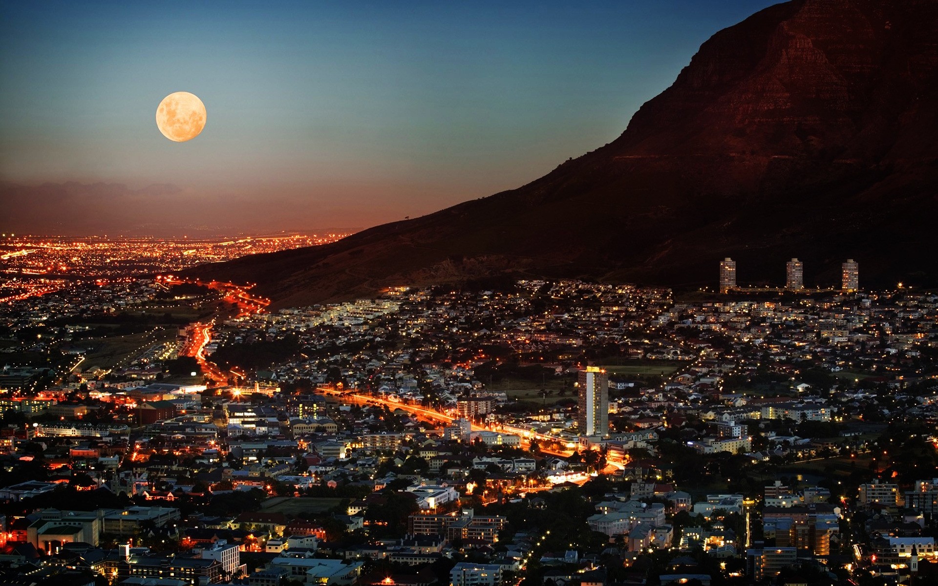 other city travel city outdoors evening sunset water architecture cape town a metropolis skyscrapers moon lights sky