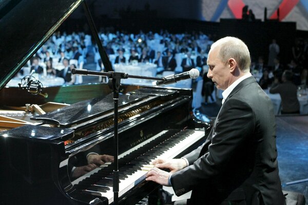 Putin plays the piano