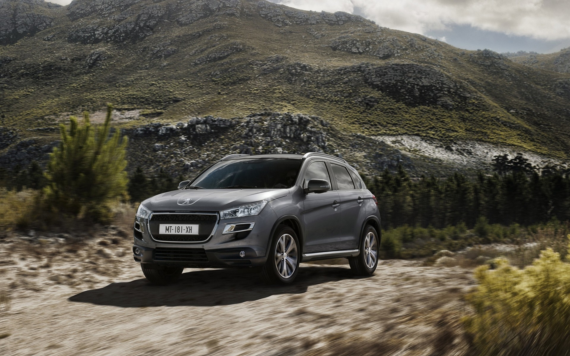 peugeot car vehicle landscape noon travel road mountain