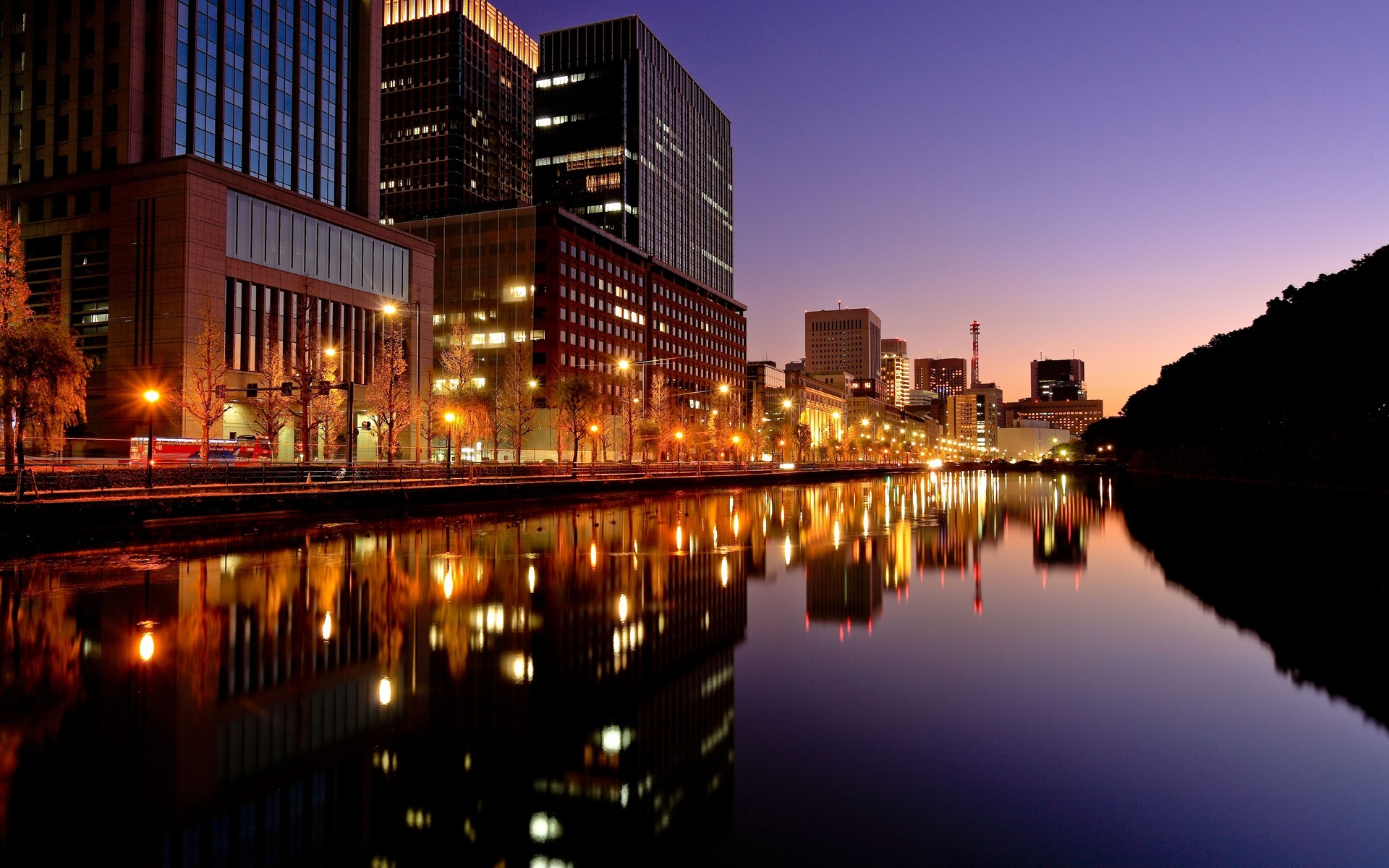 japan city architecture dusk reflection cityscape downtown building water evening travel skyline skyscraper river sky sunset urban bridge illuminated modern night night lights