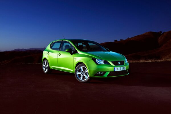 Green seat on a blue sky background