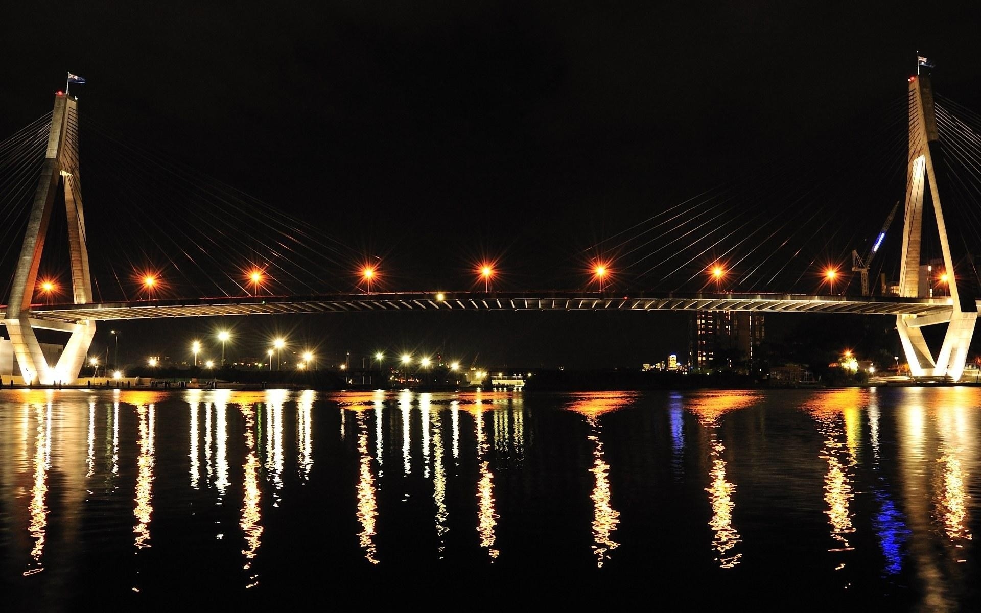 austrália ponte água viagens arquitetura pôr do sol rio crepúsculo cidade sistema de transporte reflexão céu noite ponte suspensa tráfego conexão luz urbano casa