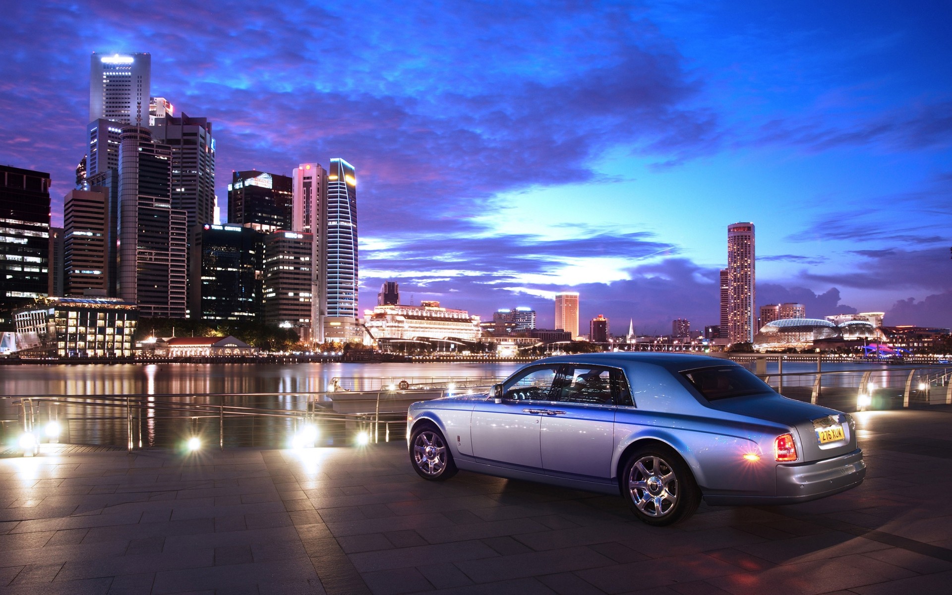 rolls royce città skyline centro città auto grattacielo architettura crepuscolo città casa viaggi urbano strada sistema di trasporto sera moderno affari auto tramonto