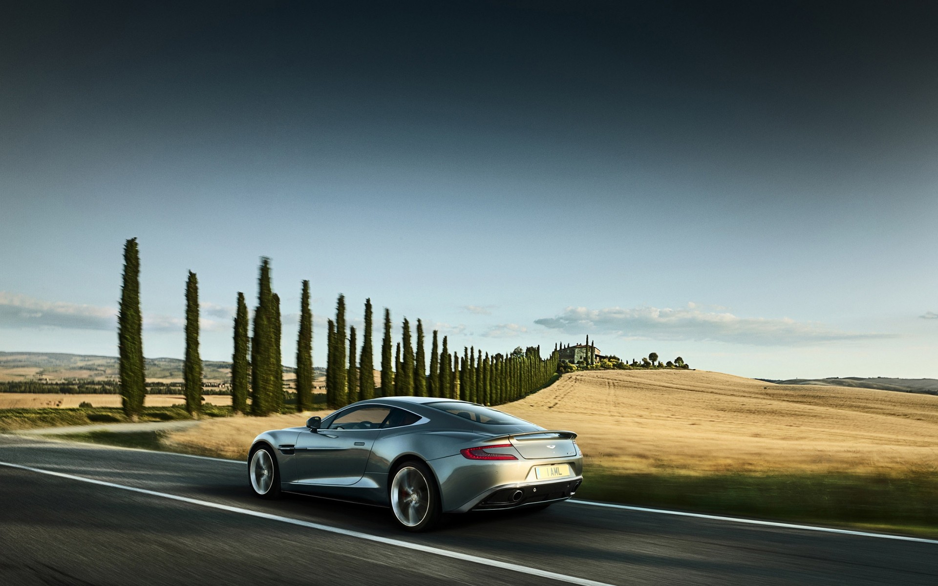 aston martin road car asphalt landscape travel transportation system hurry vehicle sunset highway sky action light aston martin vanquish