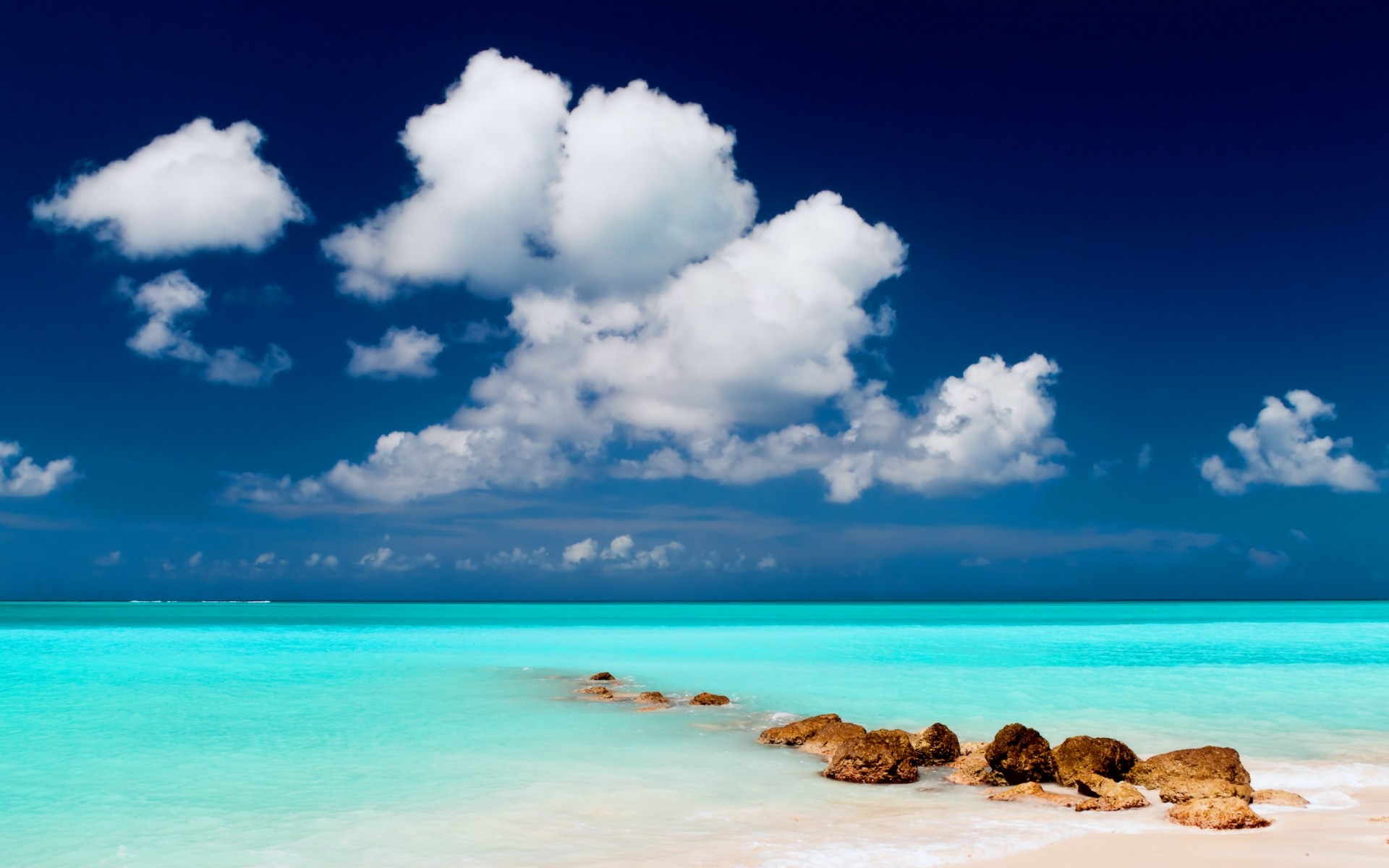 paesaggio sabbia acqua spiaggia tropicale estate sole viaggi bel tempo paesaggio idillio surf oceano isola mare cielo turchese mare cielo natura sfondo onde del mare rocce del mare